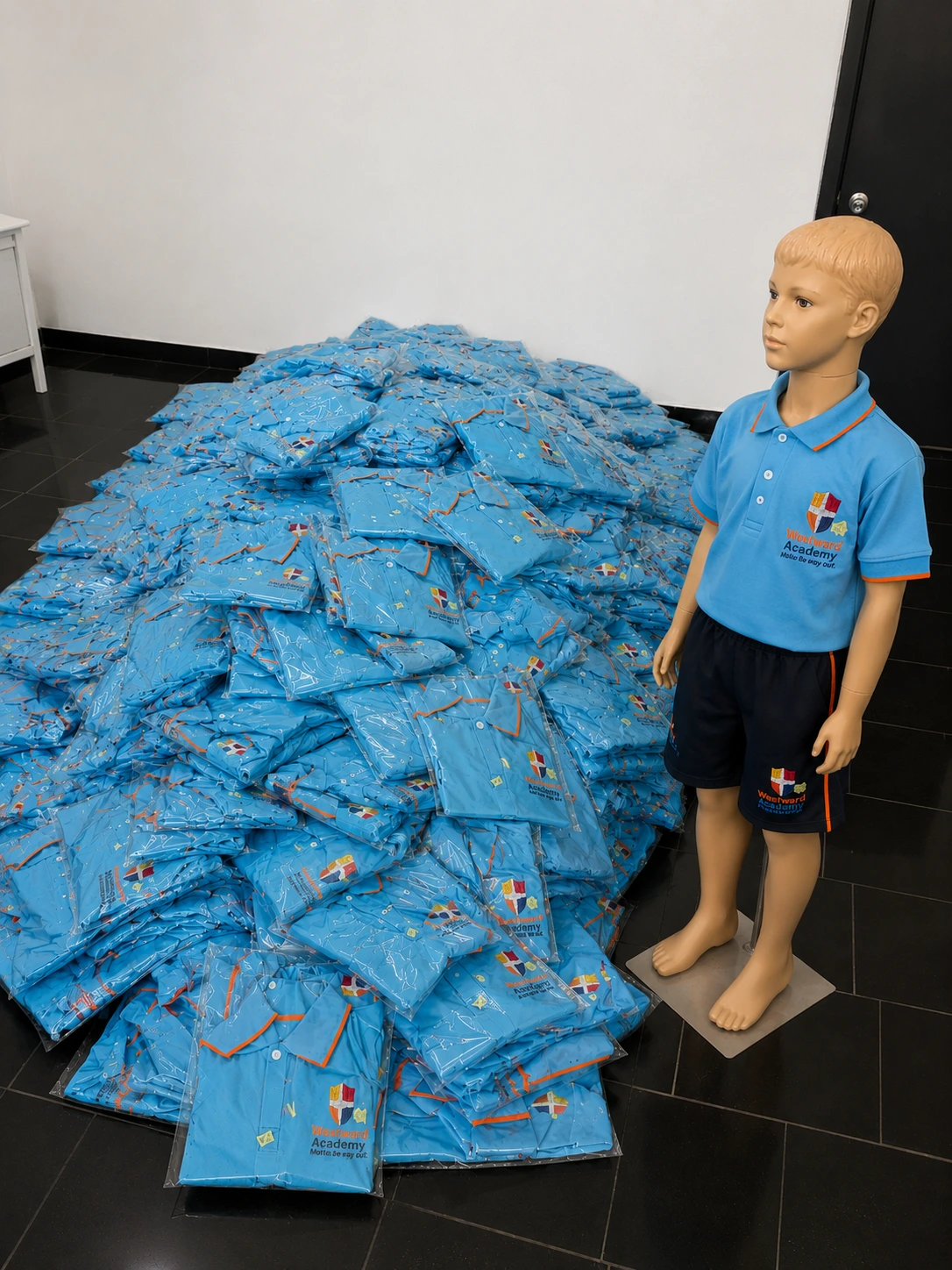West Ward Academy sportswear packaged for delivery