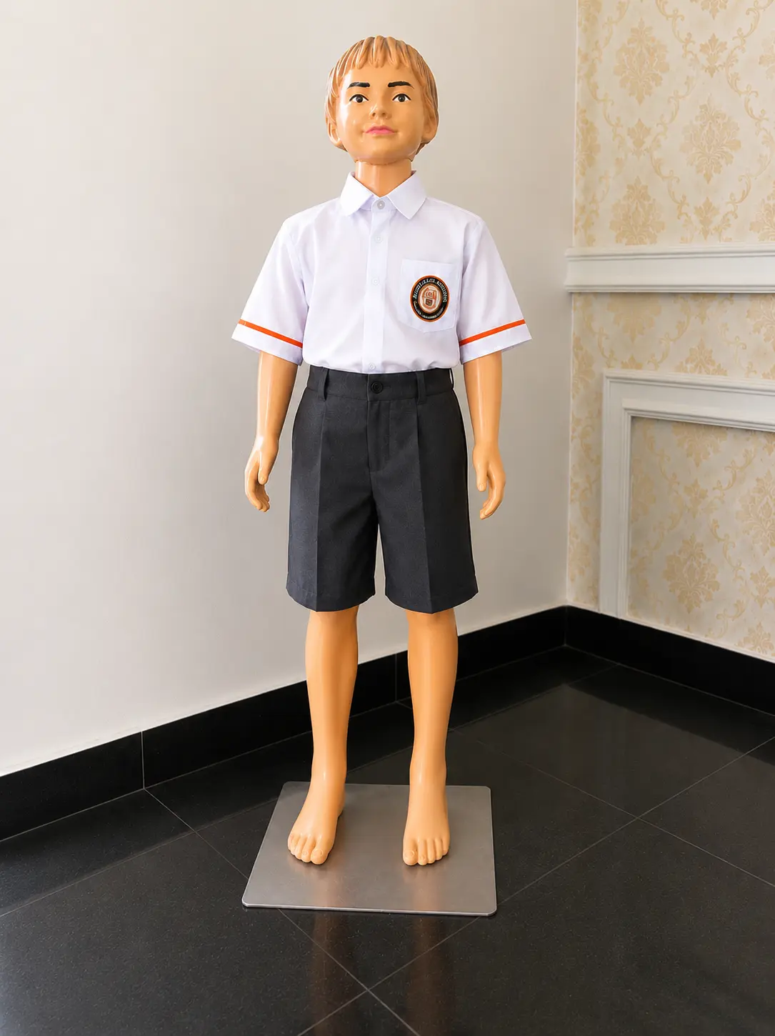 Closer view of the same institutional uniform set